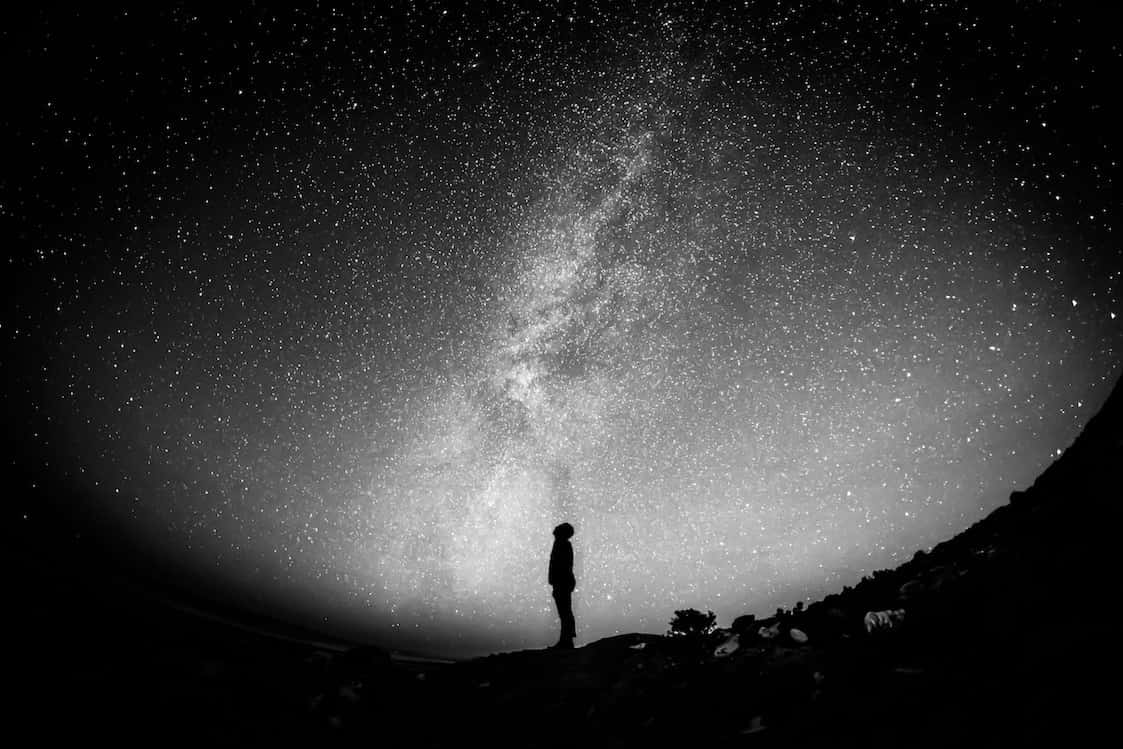 Changing Our Stars - Person looking up at stars