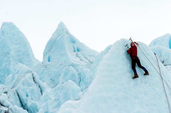 Writer In Malaysia: Man scaling ice cliffs