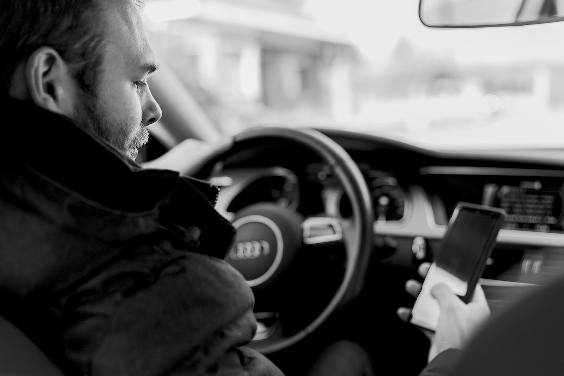 Man In Car On Phone