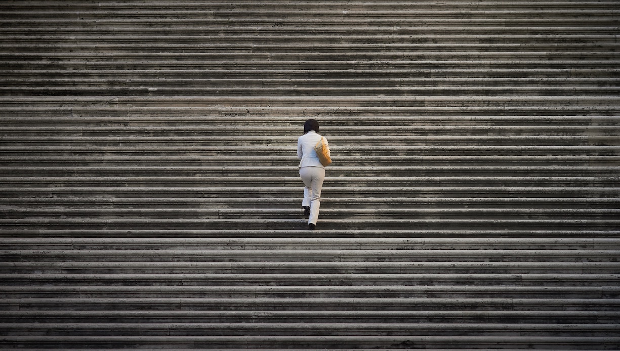 Woman climbing stairs