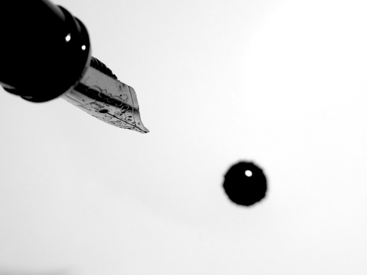 Fountain pen dripping ink
