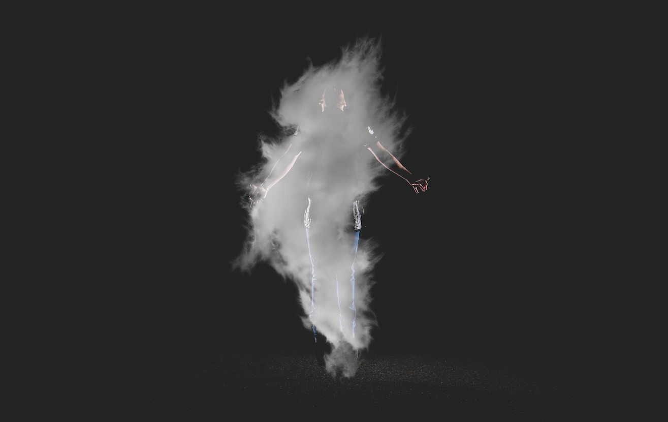 Man standing in smoke