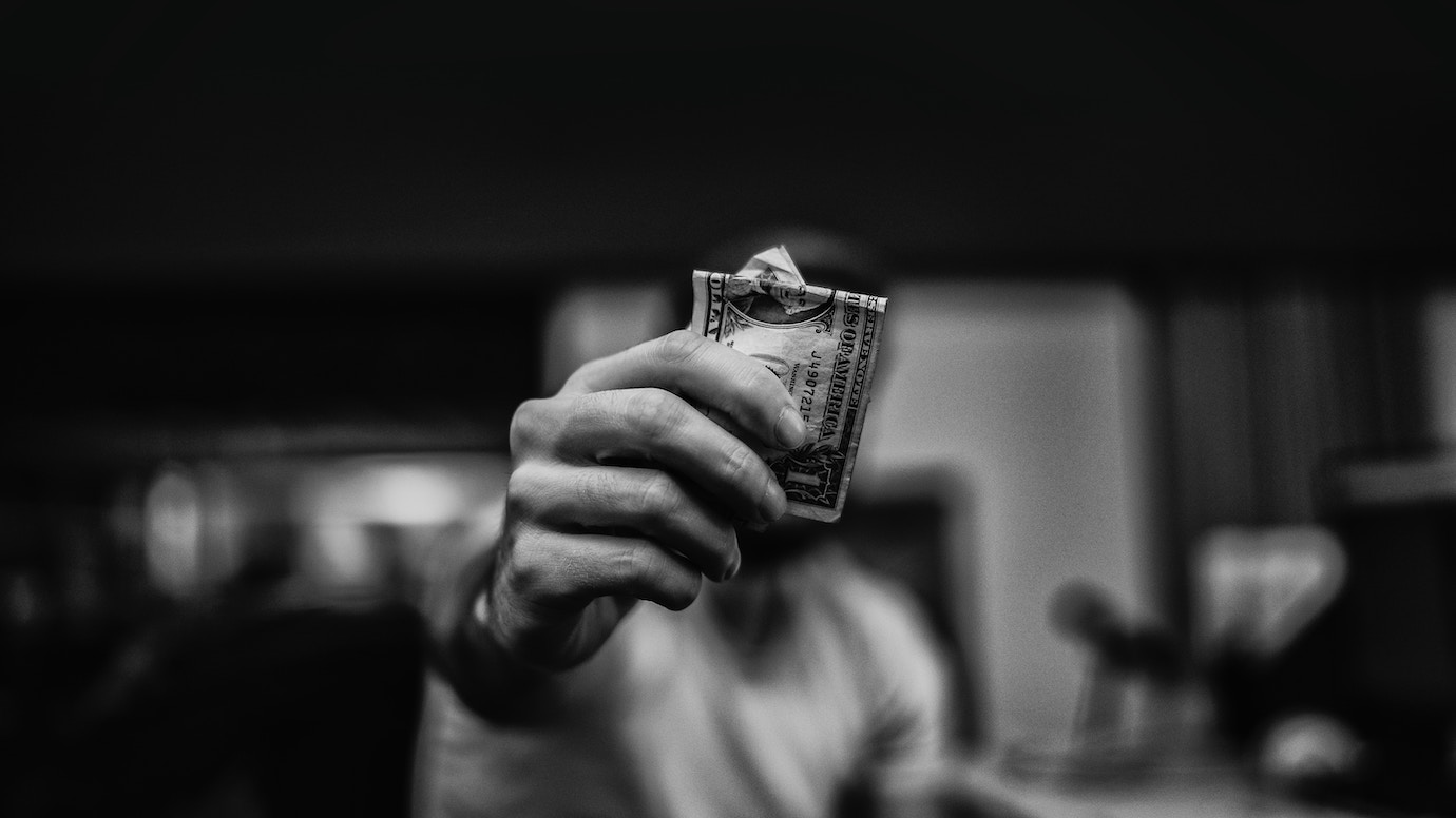 Man holding cash