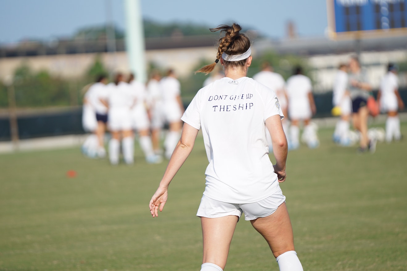 Woman at soccer field practice