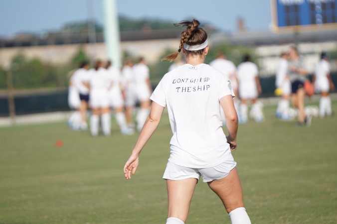 Woman at soccer field practice