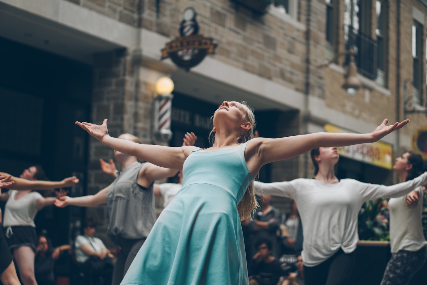 Group of people dancing in public