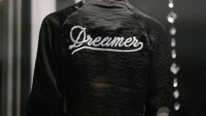 Jacket with embroidery saying 'dreamer'