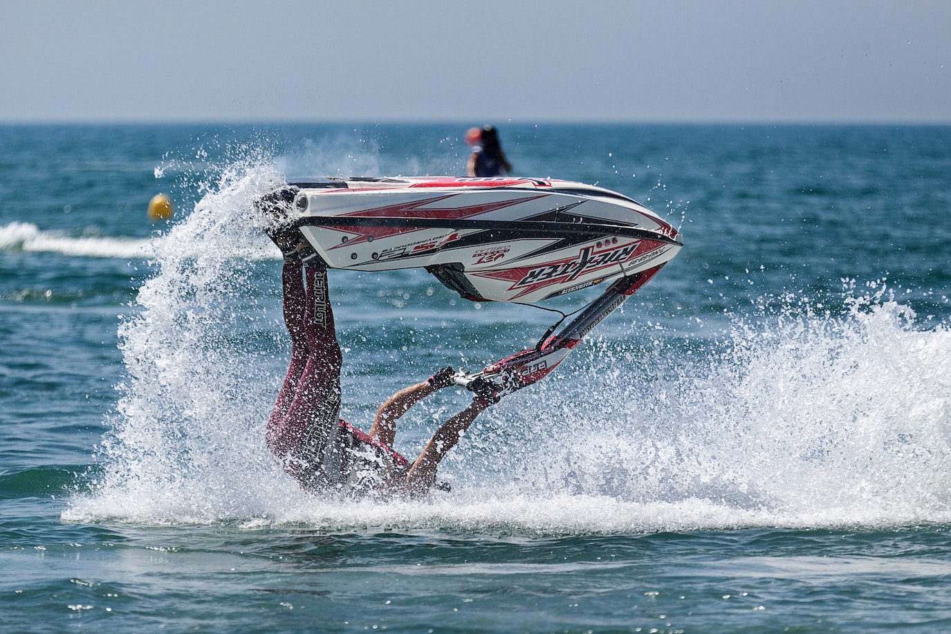 Man falling with jetski