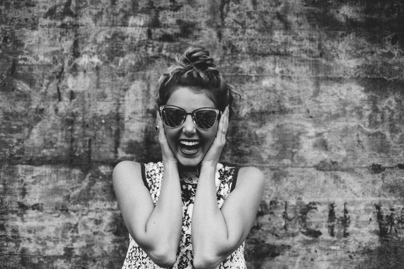 Woman in sunglasses smiling