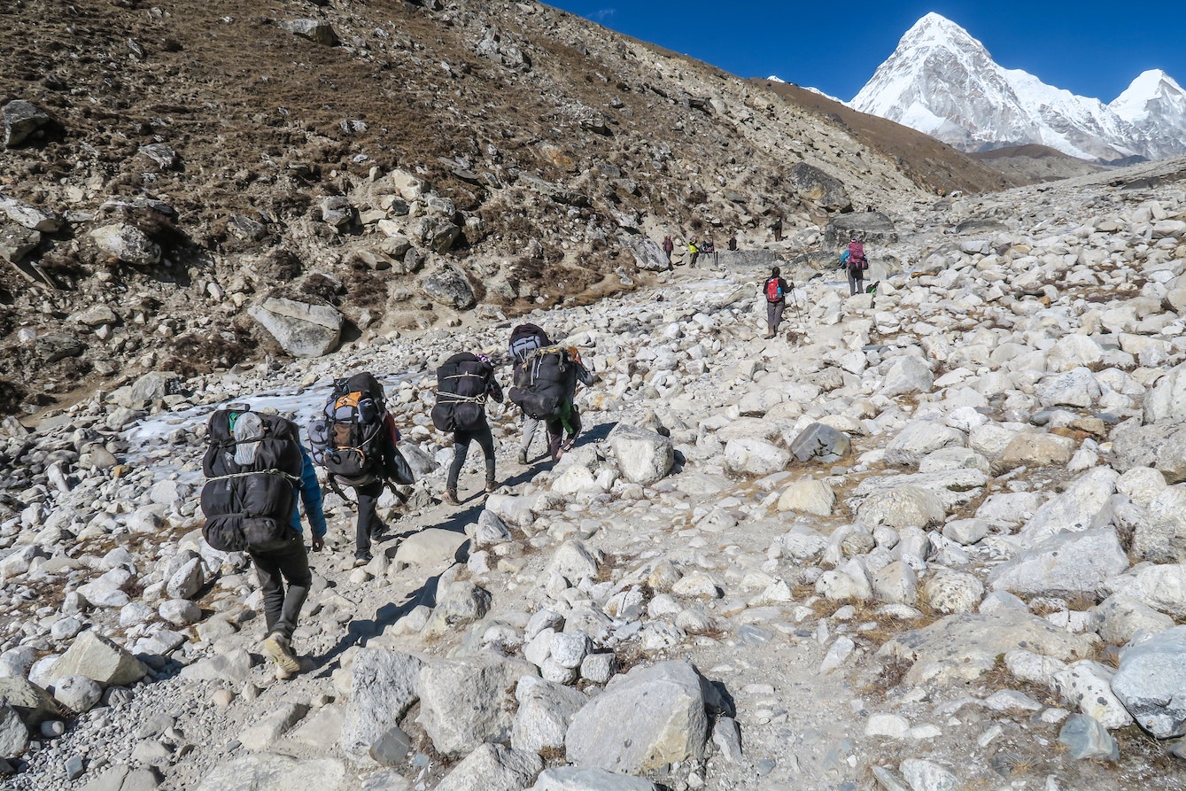 Group of people climbing Mount Everest