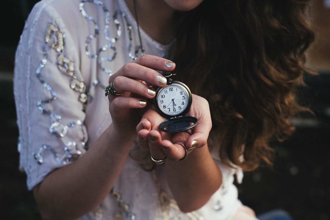 Woman holding a stopwatch