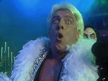 A GIF of Ric Flair woo-ing