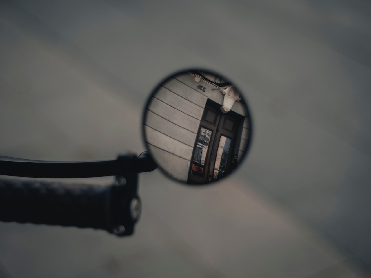 A mirror in sharp focus against a blurry background